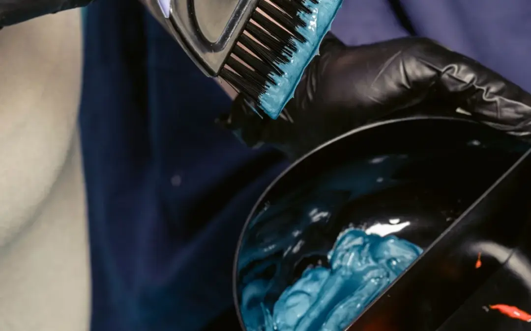 A colourist mixing hair colour in the CHAIR colour bar