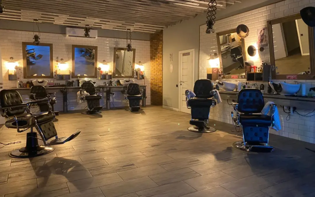 Wide view of the CHAIR salon floor and styling stations