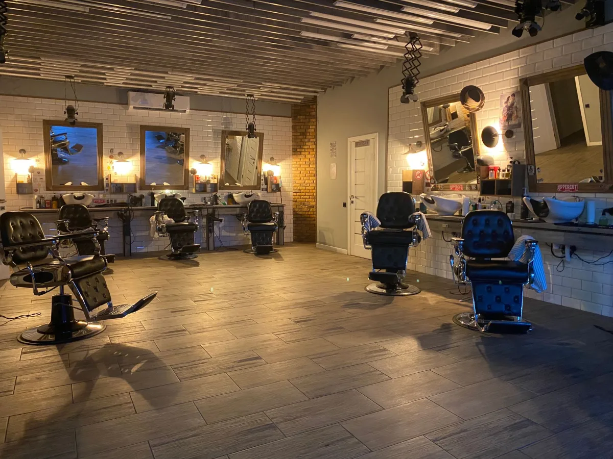 Wide view of the CHAIR salon floor and styling stations